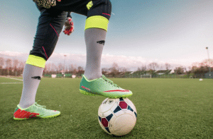 From Grass to Turf Which Soccer Shoe Style is Best for Your Playing Surface?