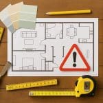 Modern kitchen renovation with organized tools and materials for efficient home improvement tips