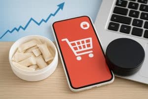 Nicotine pouches displayed with smartphones and digital shopping icons for online sales trends